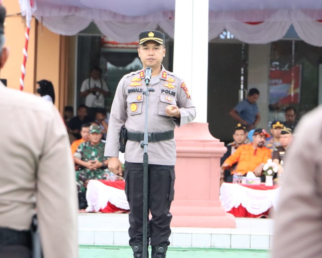 Kapolres Pimpin Apel Gelar Pasukan dan Peralatan Dalam Rangka Kesiapsiagaan Penanganan Karhutla di Kabupaten Siak