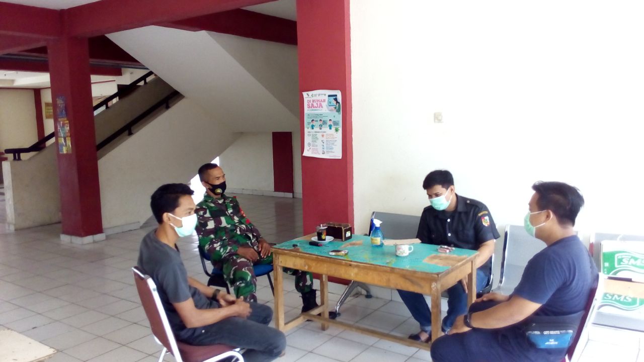 Anggota Kodim 0301/PBR Laksanakan Pengamanan dan Monitoring Aktivitas Pasien Covid-19 Tanpa Gejala Di Rusunawa