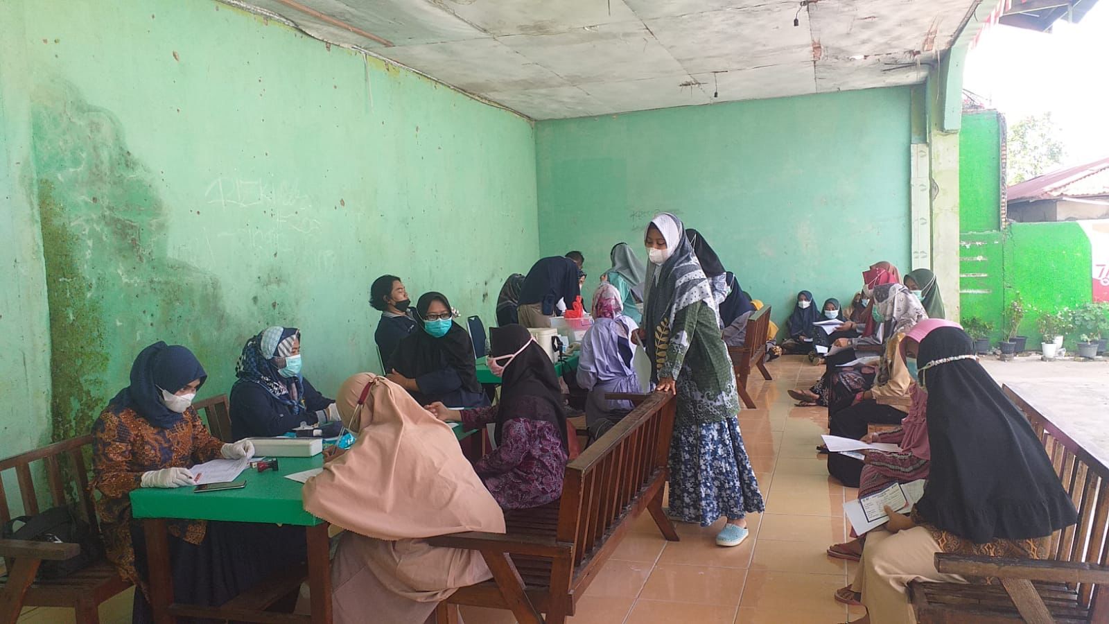 Tenaga Kesehatan Polresta Pekanbaru Gelar Vaksinasi Tahap II Di Pondok Pesantren Nurul Huda Al Islami