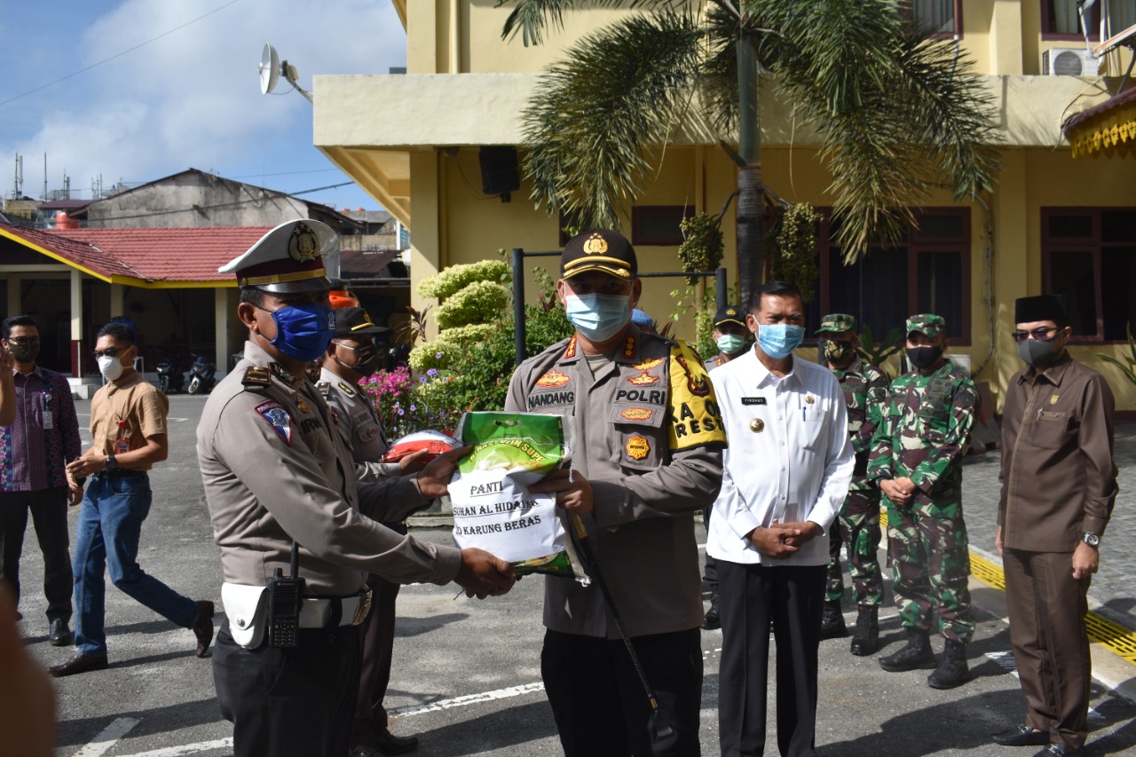 Polresta Pekanbaru Laksanakan Kegiatan Gerakan Bakti Sosial Polri Peduli Covid-19