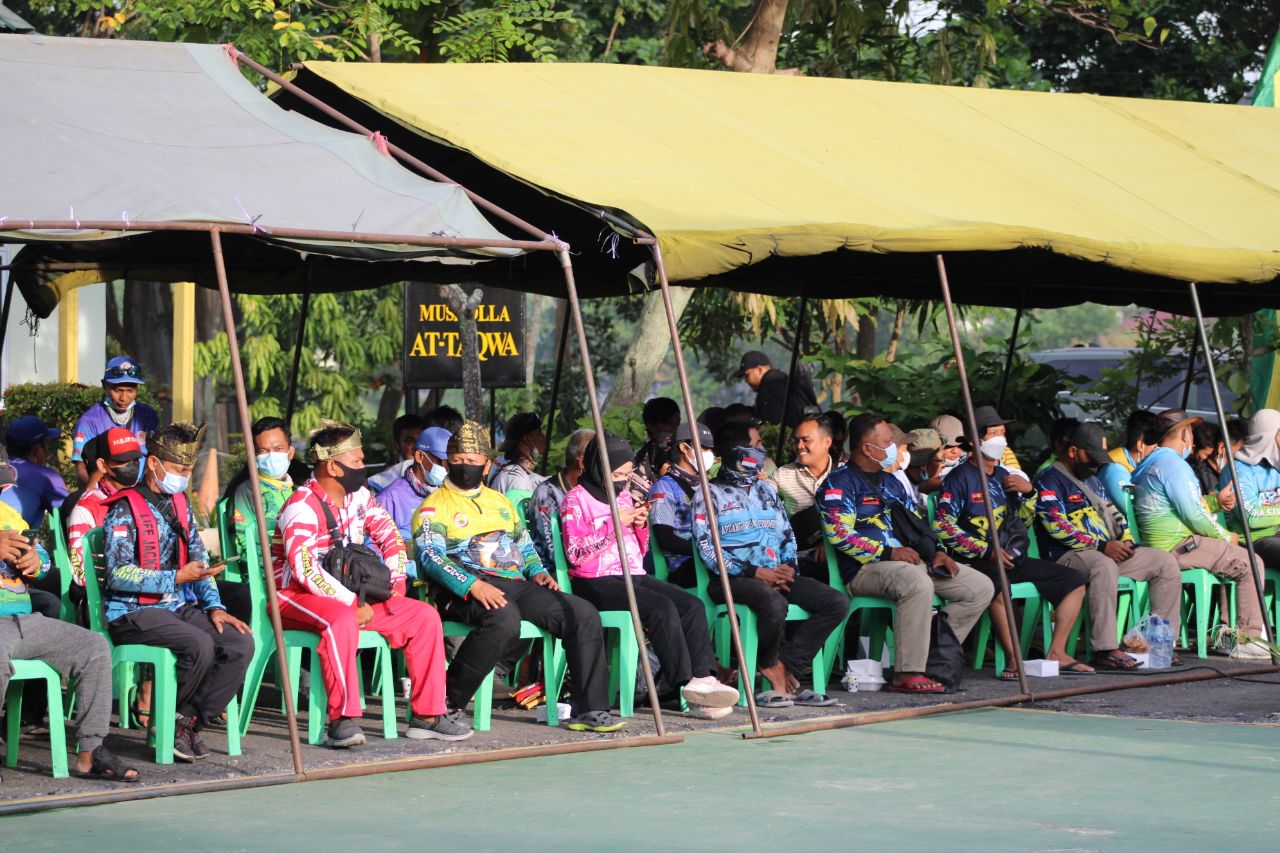 Dandim 0301/PBR Hadiri Pembukaan Lomba Mancing, Baksos, Vaksinasi Massal Serta Penaburan Bibit Ikan di Sungai Siak