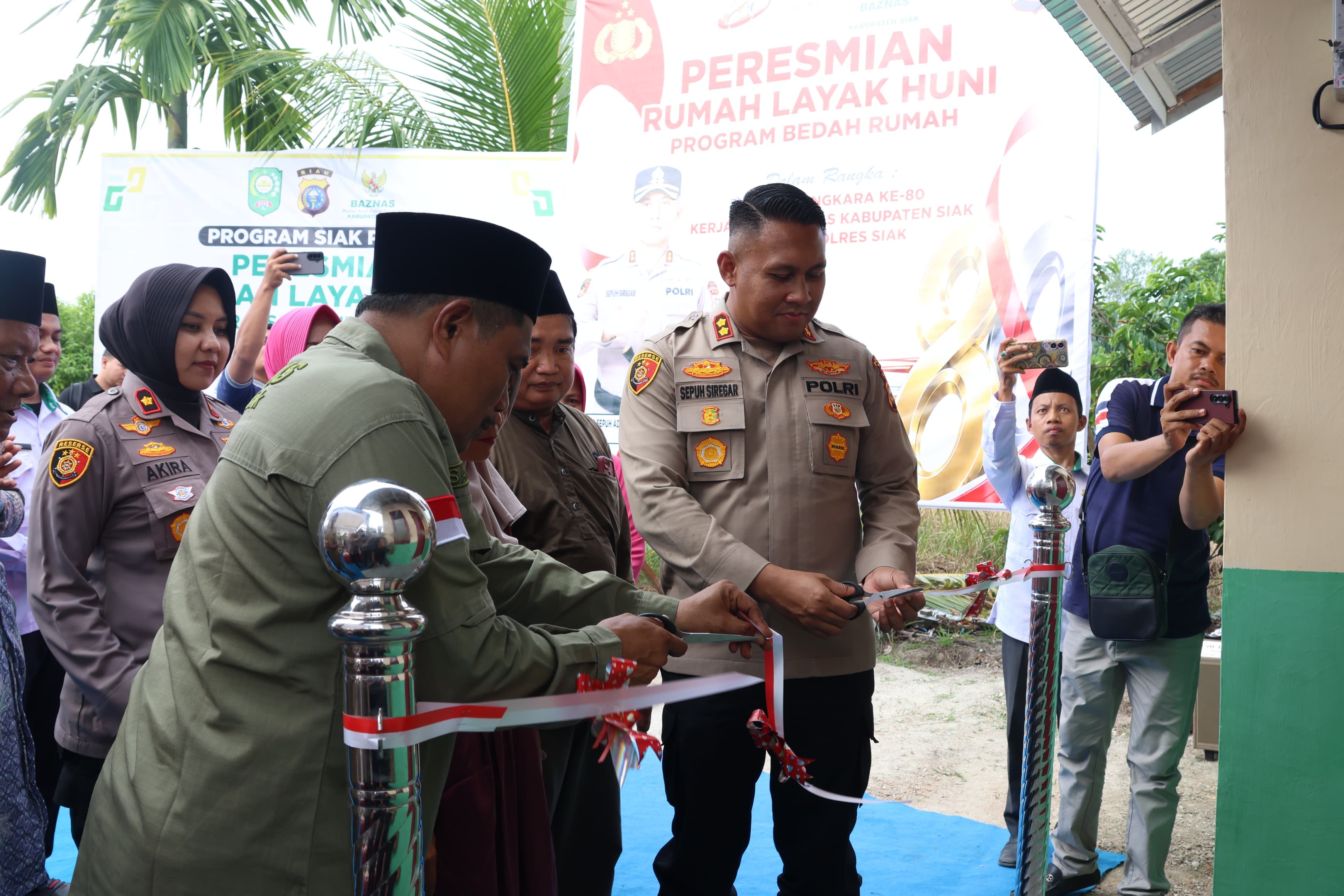 Sinergi Polres Siak dan BAZNAS, Rumah Ke 8 Program, 'Bedah Rumah Presisi' Diresmikan Dan Diserahkan Kepada Penerima Manfaat