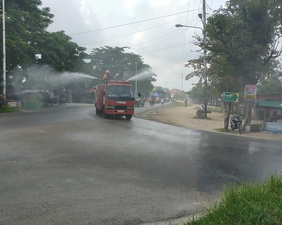 Kasdim 0301/PBR Hadir Dalam Kegiatan Penyemprotan Disinfektan Massal Secara Serentak di Polresta Pekanbaru