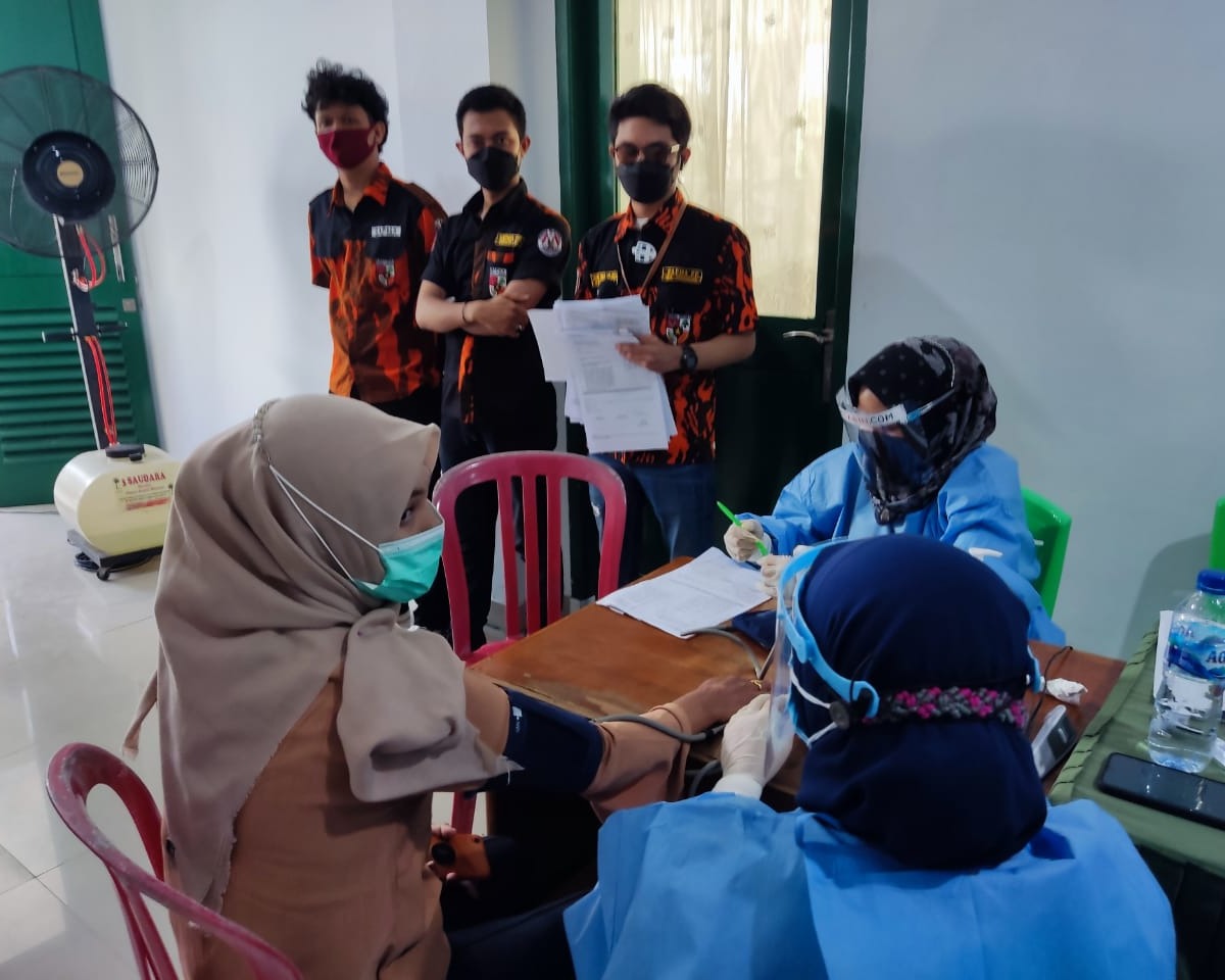 Kodim 0301/PBR Kerjasama Dengan Organisasi Kepemudaan Satma PP dan MPC Pemuda Pancasila Laksanakan Vaksinasi Dosis Pertama