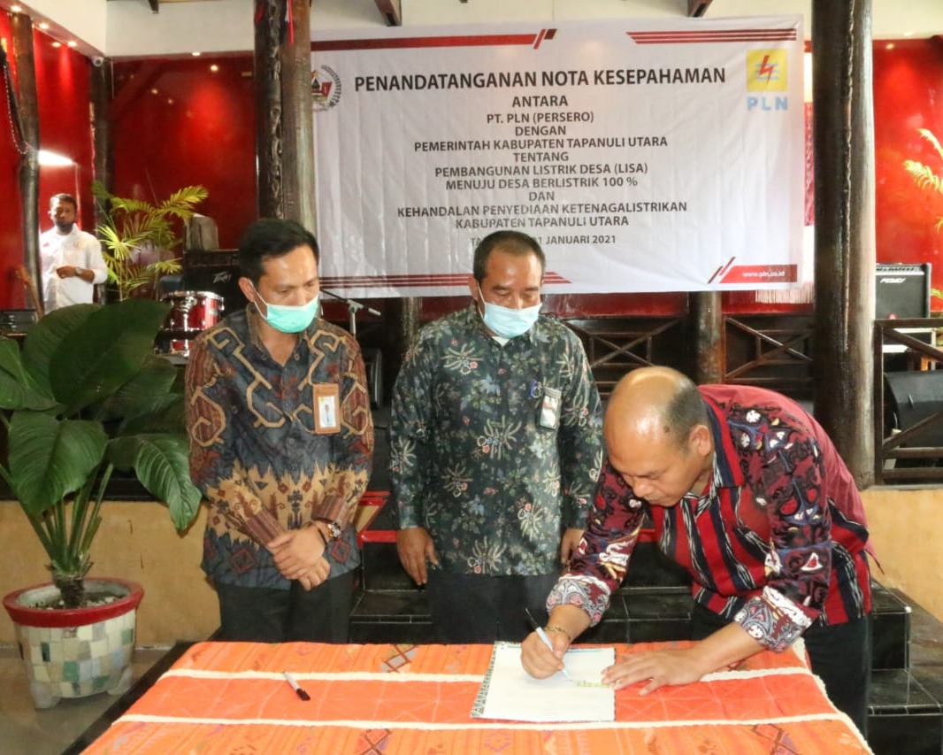 Bupati Taput Tandatangani Nota Kesepahaman Dengan PLN Tentang Pembangunan Listrik Desa Menuju Desa Berlistrik 100 %