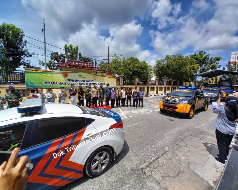 Polresta Pekanbaru Salurkan Bantuan 10 Ton Beras Dari Yayasan Budha Tzu Chi Indonesia