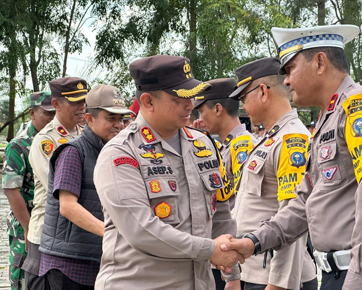 Kapolres Pimpin Apel Pelepasan BKO Personil Polda Riau PAM Pilkada 2024 Kabupaten Siak