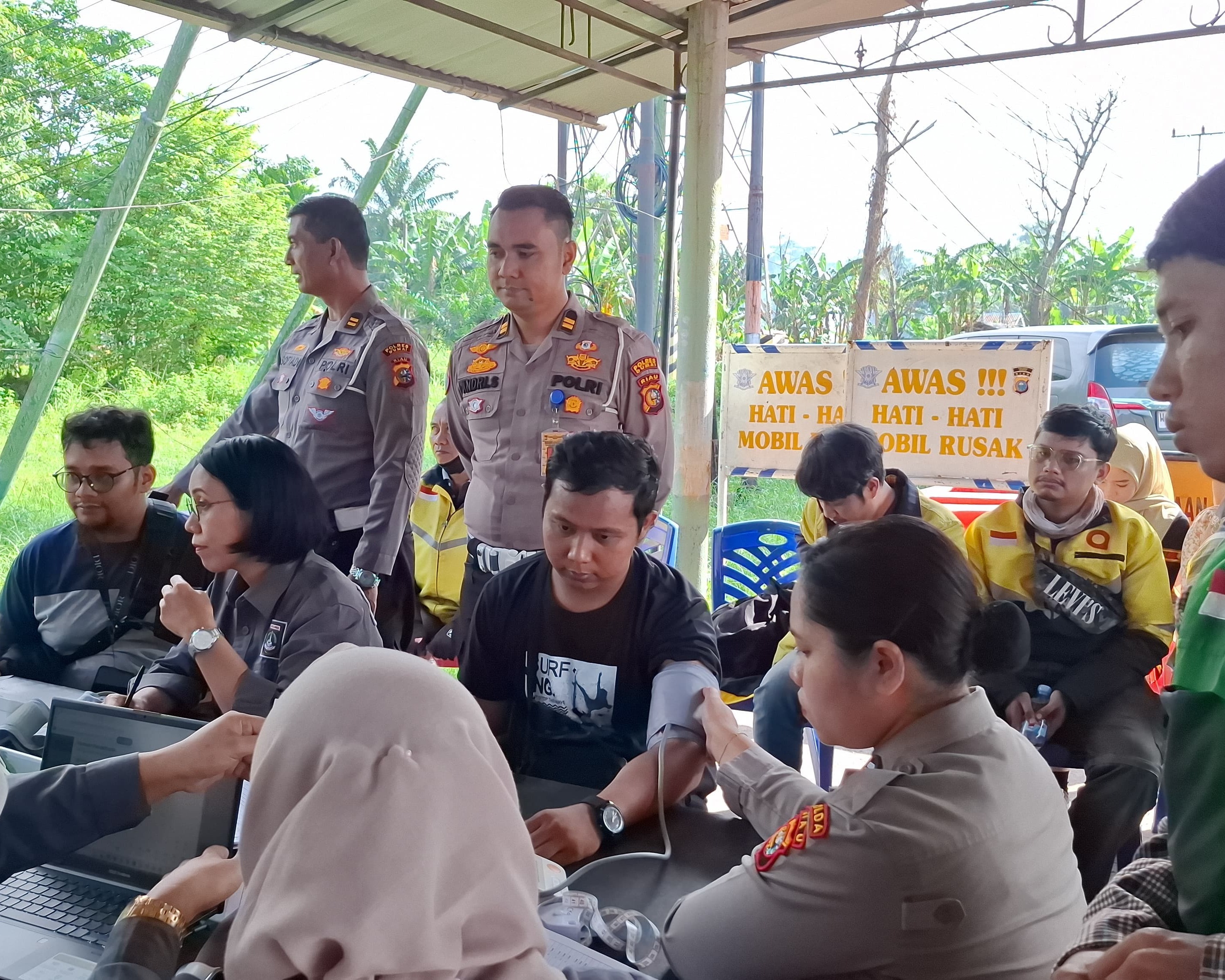 Polres Dumai Gelar Bakti Kesehatan Gratis Untuk Pengemudi Ojek Online Dalam Rangka HUT Ke-70 Polisi Lalu Lintas