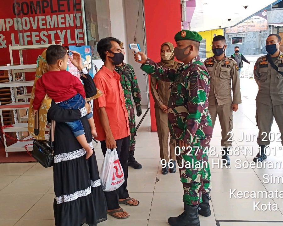 Pasiops Kodim 0301/Pekanbaru Ajak Warga Ikut Gerakan Disiplin Protokol Kesehatan