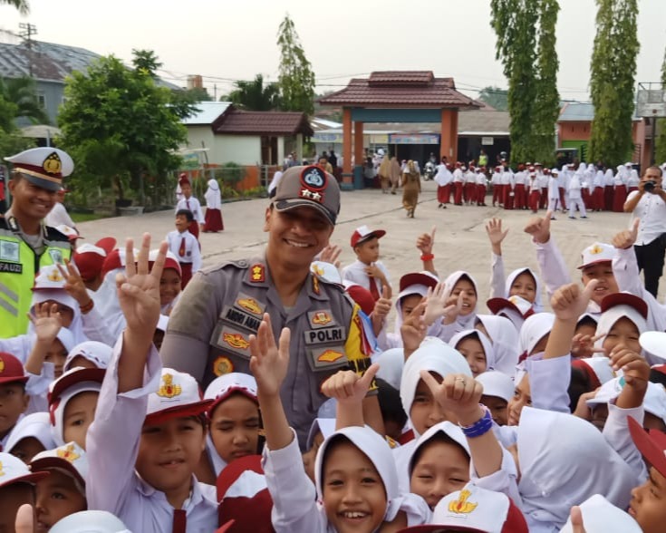Kapolres Kampar Gelar Police Goes To School di SD Negeri 005 Langgini Kecamatan Bangkinang Kota