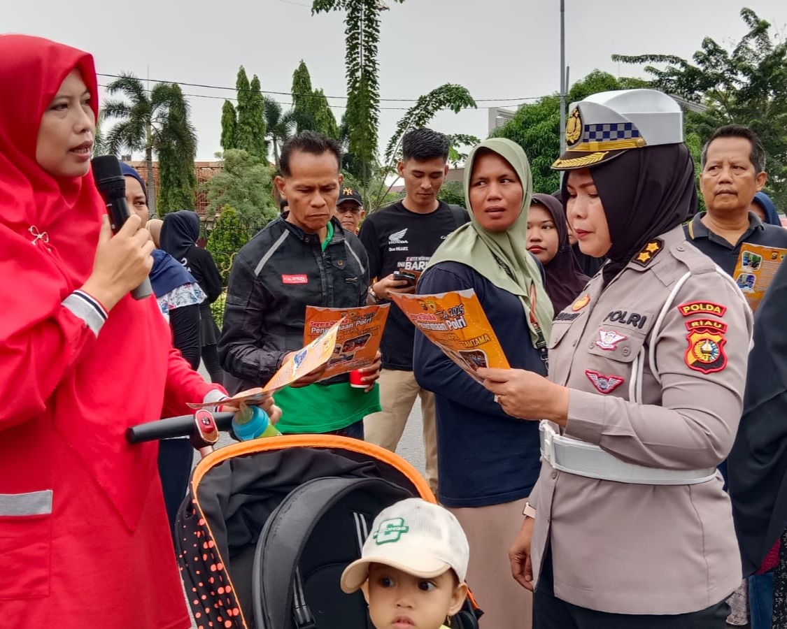 Tim Cooling System Ditlantas Polda Riau Ajak Masyarakat Tertib Berlalu Lintas dan Tidak Golput